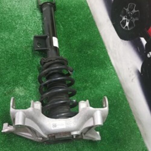 Амортизатор передній лівий